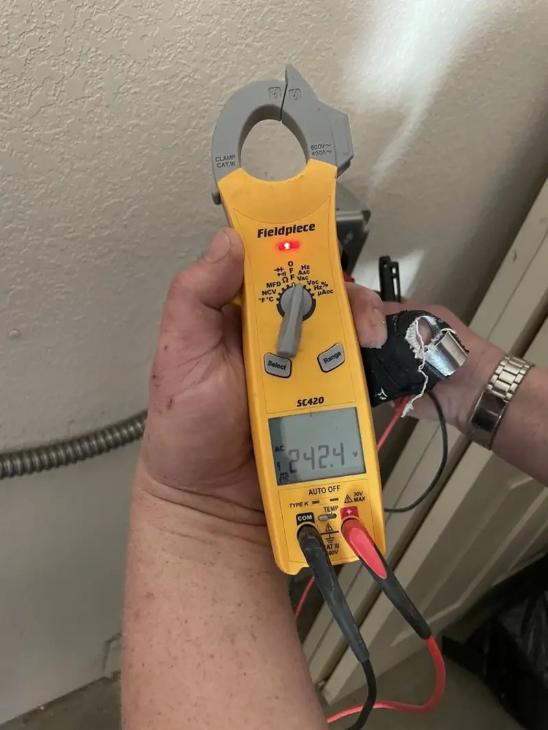 Voltage testing with clamp meter during Hot Tub / Pool Electrical Wiring in White Rock
